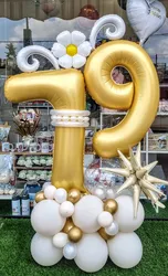 מעמד בלונים קלאסי בזהב ולבן